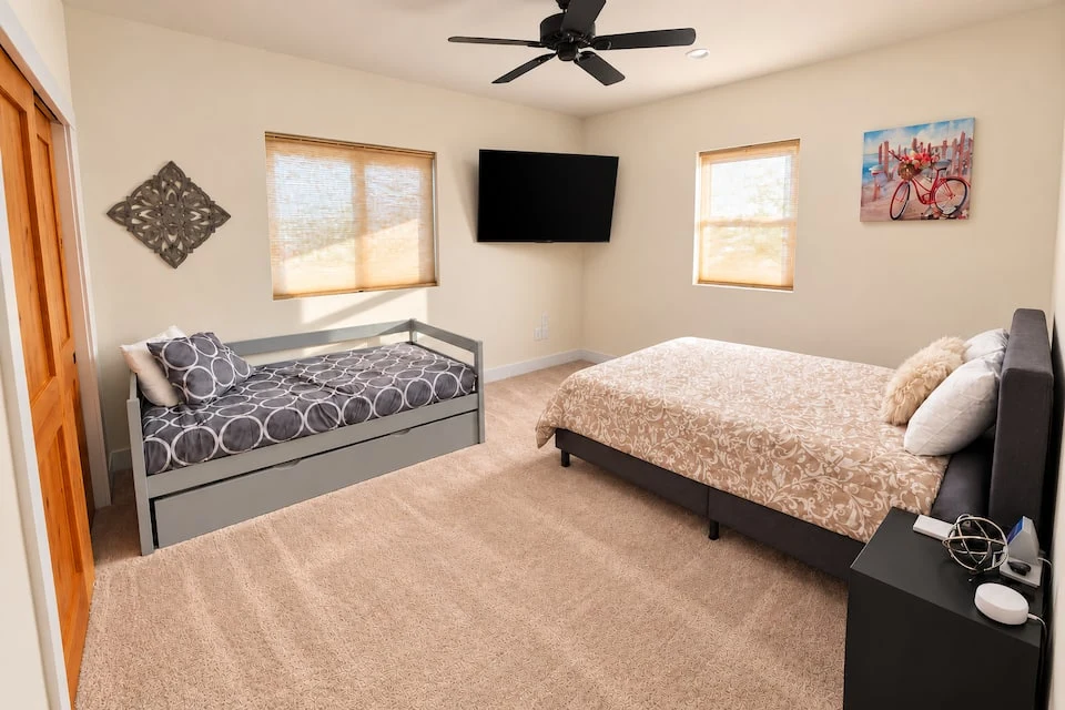 Third bedroom with queen bed and trundle daybed